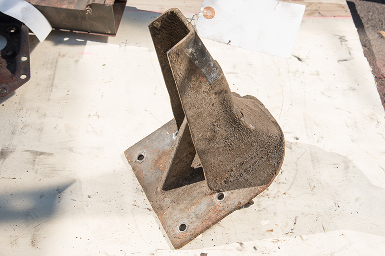 Front Cab To Frame Bracket - Used
